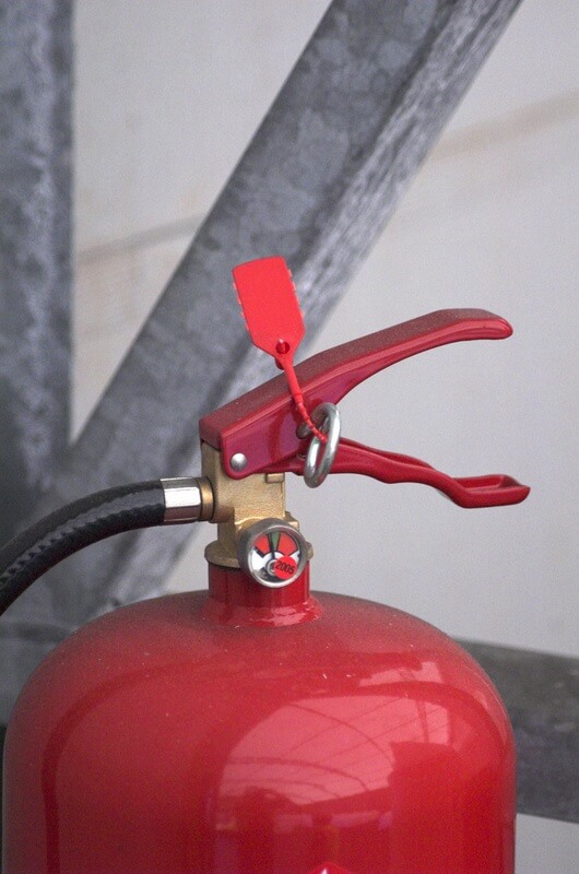 Fire seal on a fire extinguisher